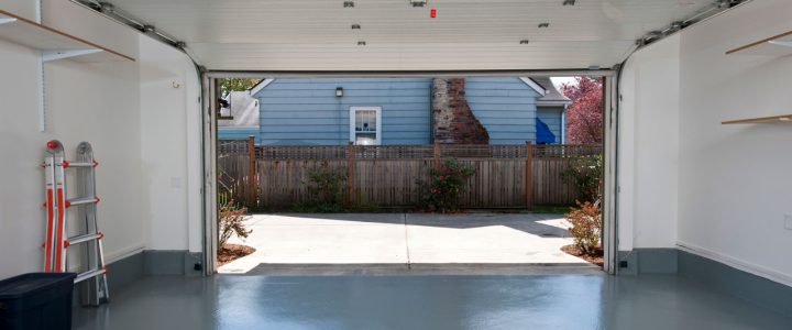 A beautifully finished decorative concrete garage floor with epoxy coating.